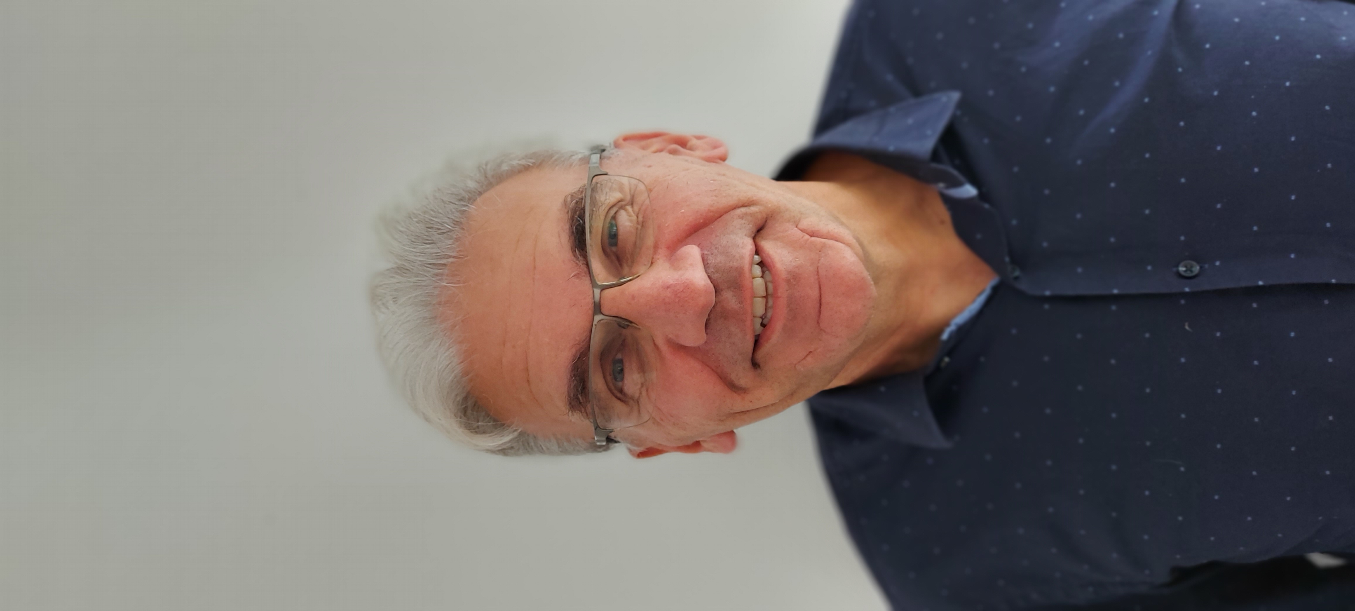 Mr. Roger van den Broek